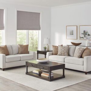 Christine beige chenille sofa and loveseat set in a living room