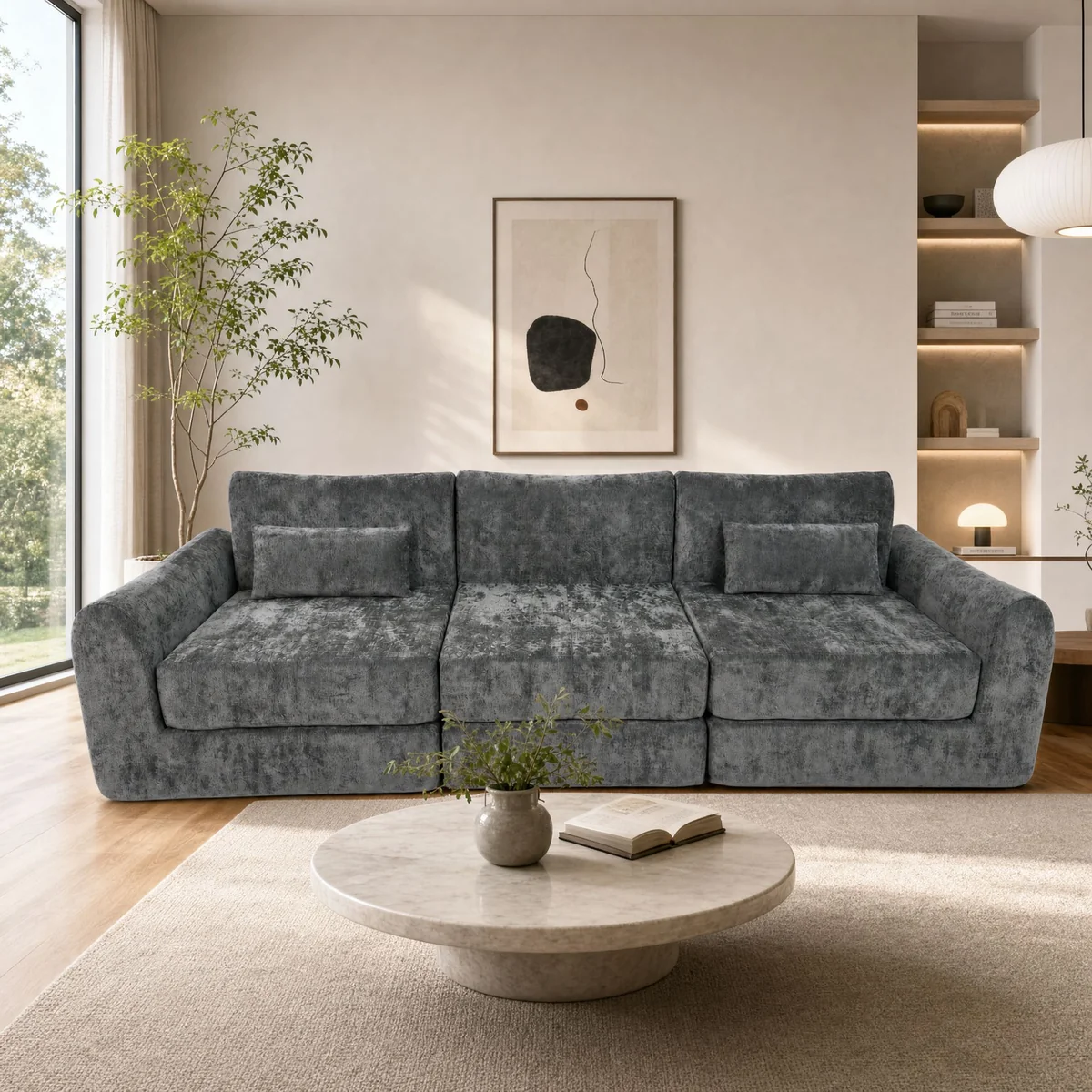 Oversized gray sofa with deep seating and lumbar pillows